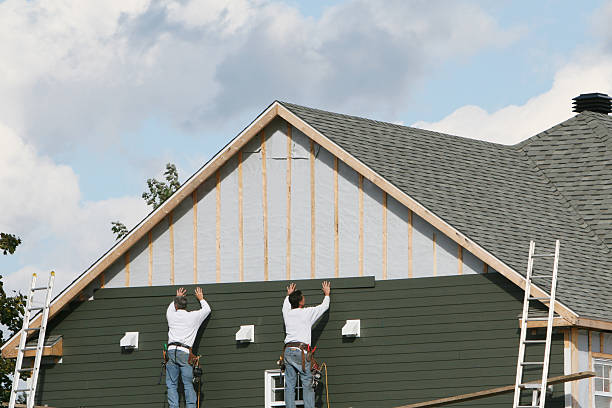 Professional Siding technician working in Bennett, NC